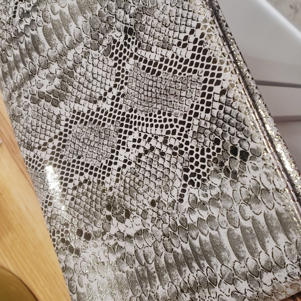 Channing snake embossed clutch